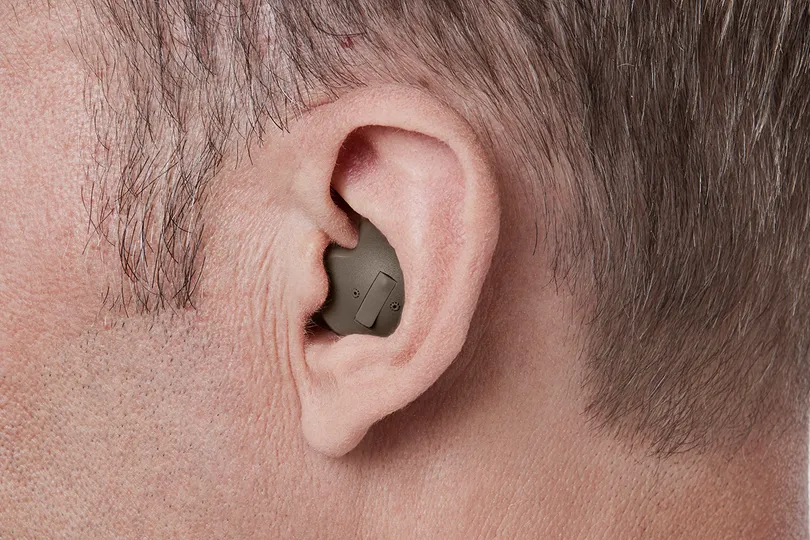 In the ear — full shell hearing aid shown worn in the ear